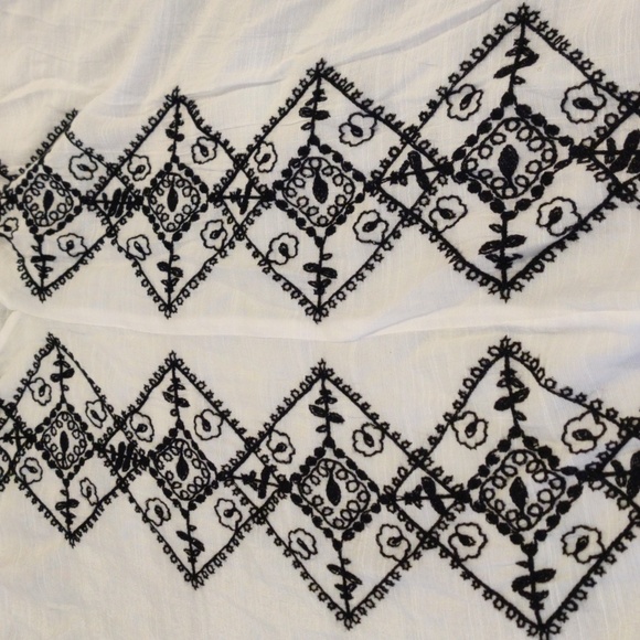 NYCC Semi-transparent white blouse with black embroidery on the front. - Picture 5 of 10